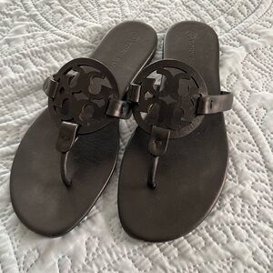 Tory Burch black leather sandal.
